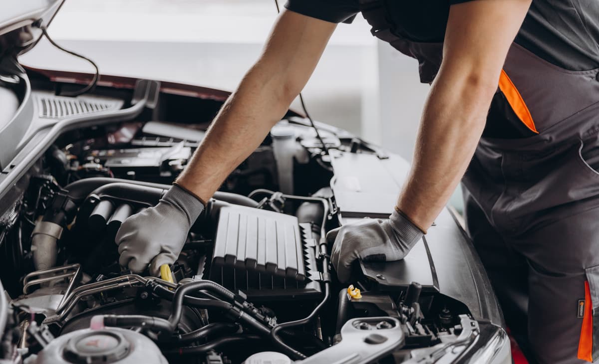 Mechanic working on a car